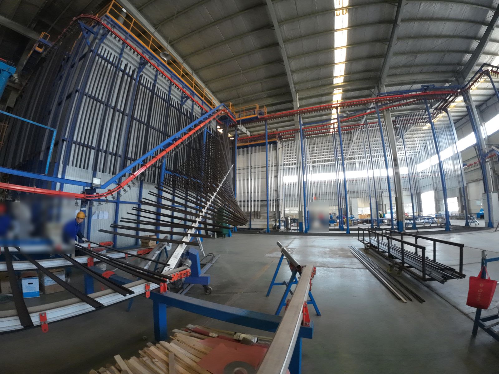 Aluminum profiles on the anodizing rack handling line