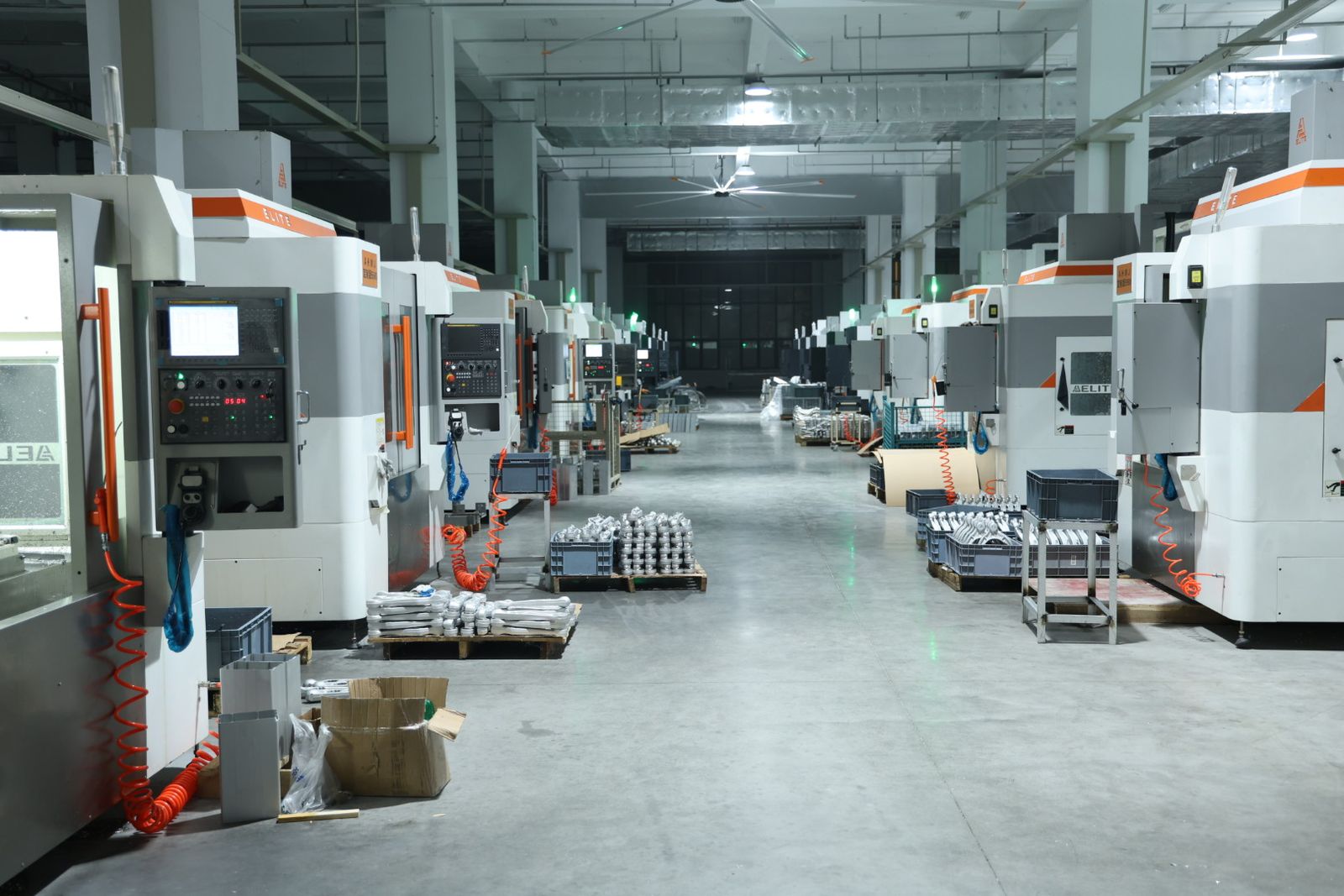 Rows of vertical machining centers in AOYIN CNC workshop