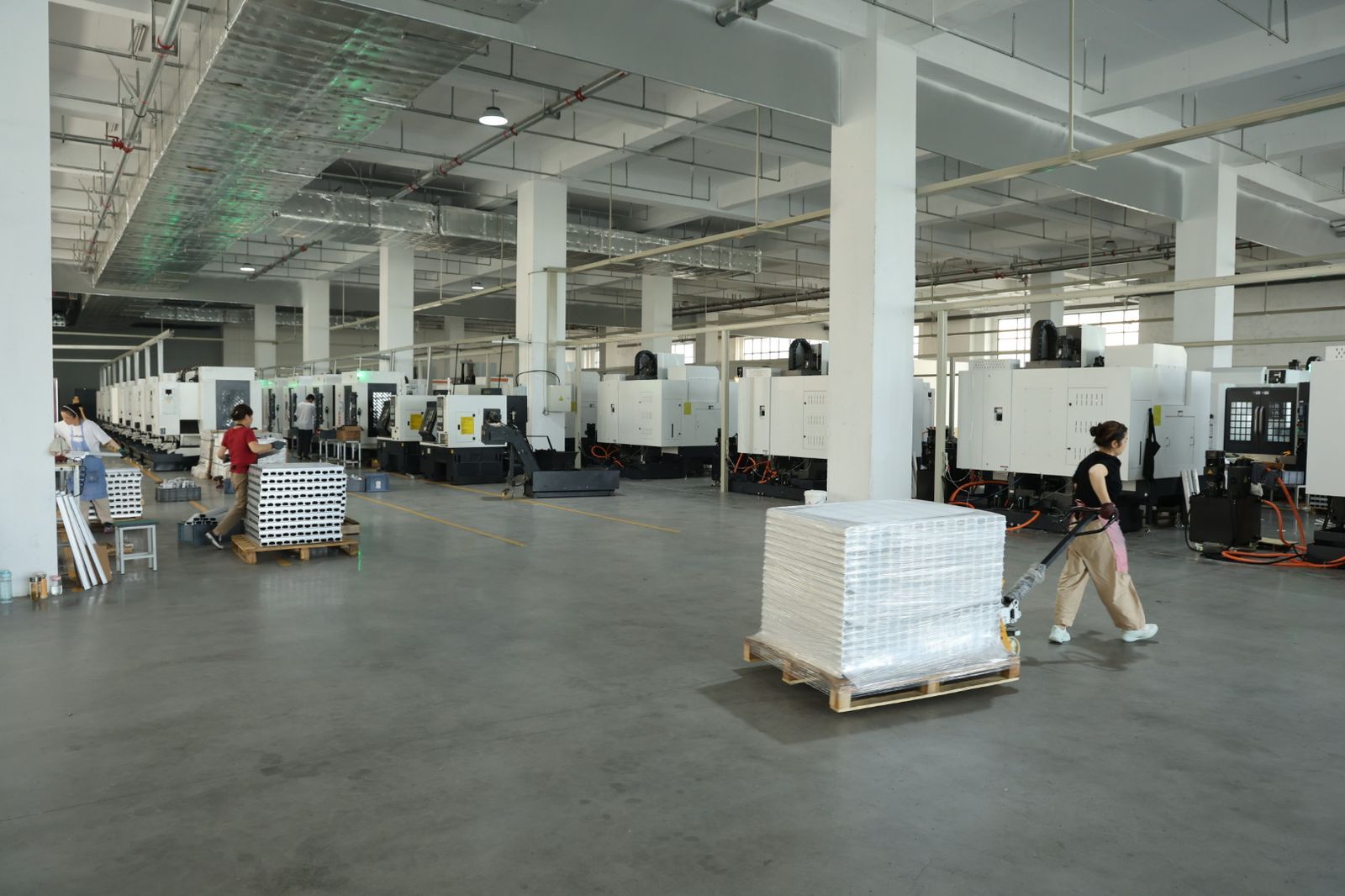 AOYIN CNC machining workshop overview with rows of machining centers