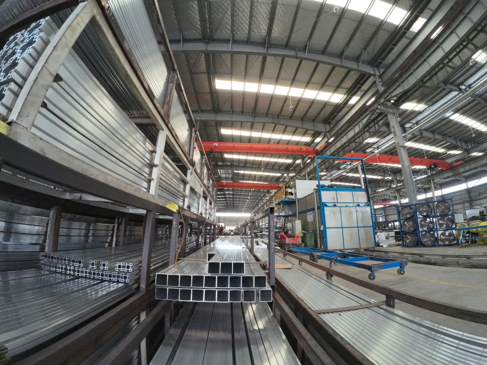 Finished aluminum profiles stored in racks after aging